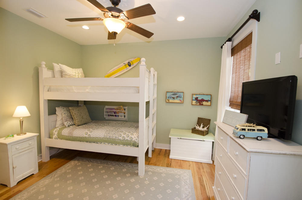 157 East Cobia Run Inlet Beach Inlet Beach, FL 32461 - Photo 12 of 27 a bedroom with a bed and a flat tv screen on dresser