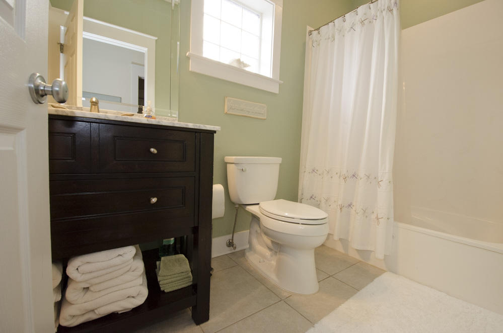 157 East Cobia Run Inlet Beach Inlet Beach, FL 32461 - Photo 13 of 27 a bathroom with a toilet a sink and mirror