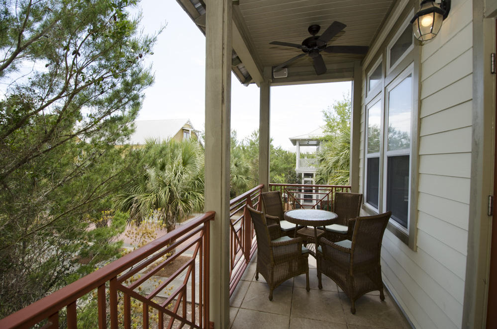 157 East Cobia Run Inlet Beach Inlet Beach, FL 32461 - Photo 14 of 27 a view of a porch with furniture and a yard