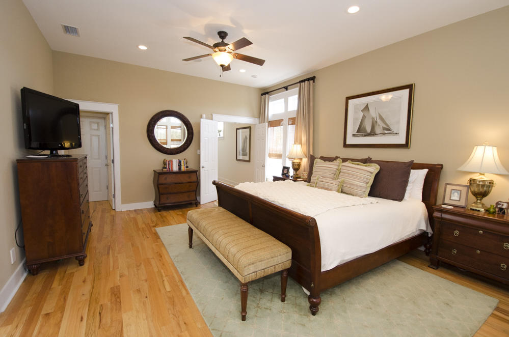 157 East Cobia Run Inlet Beach Inlet Beach, FL 32461 - Photo 15 of 27 a spacious bedroom with a bed and a chandelier
