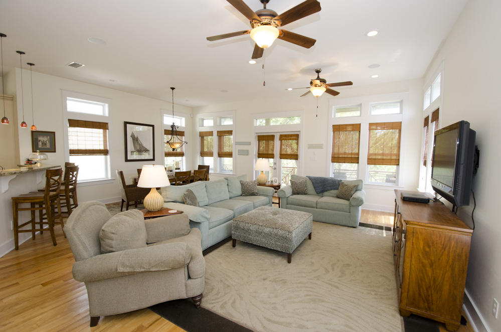 157 East Cobia Run Inlet Beach Inlet Beach, FL 32461 - Photo 3 of 27 a living room with furniture a ceiling fan and a flat screen tv