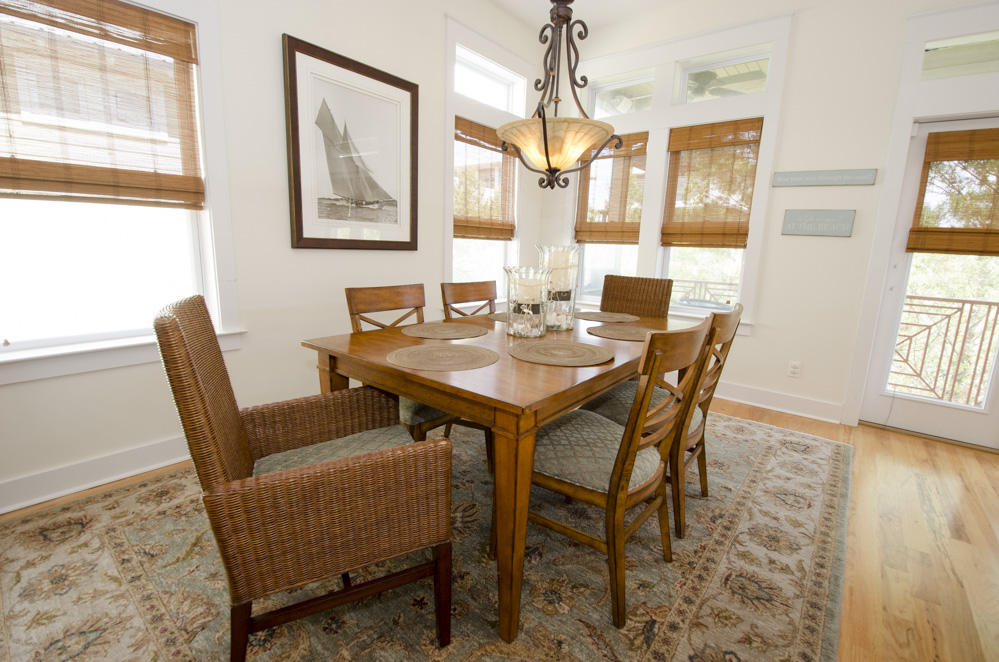 157 East Cobia Run Inlet Beach Inlet Beach, FL 32461 - Photo 6 of 27 a view of a dining room with furniture and wooden floor