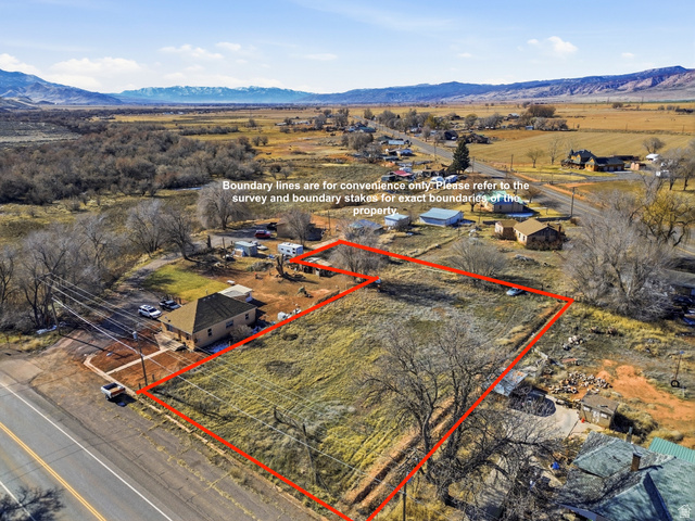 66 South State Street Sigurd, UT 84657 - Photo 4 of 13 View of rural area featuring a mountain backdrop and property boundaries highlighted
