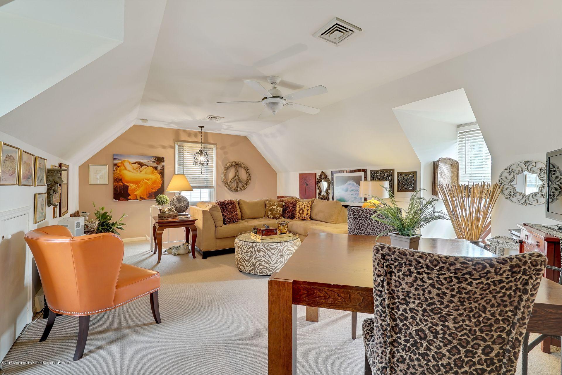 Union Avenue, Unit B Brielle, NJ 08730 - Photo 17 of 28 a living room with furniture and wooden floor