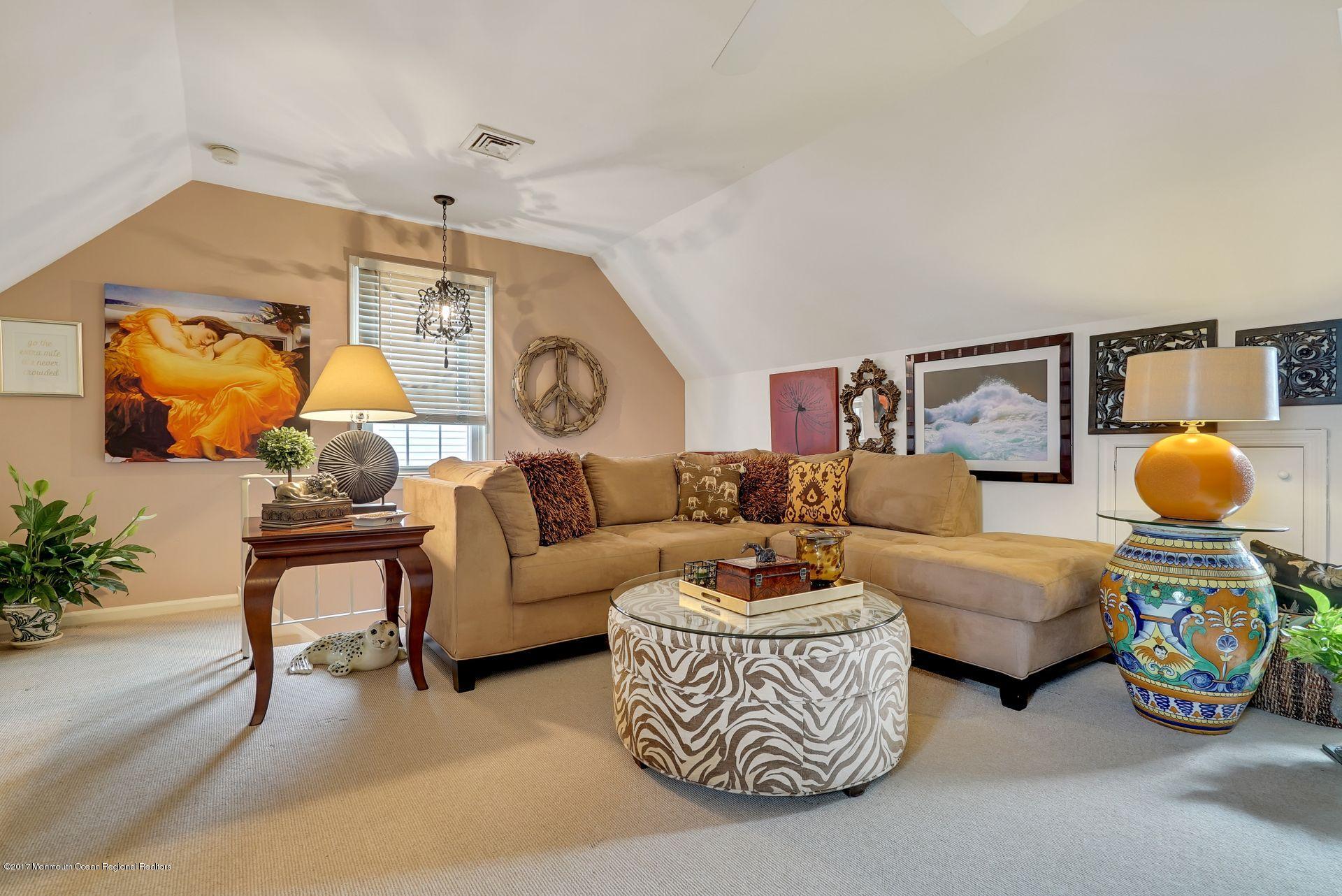 Union Avenue, Unit B Brielle, NJ 08730 - Photo 18 of 28 a living room with furniture and a lamp