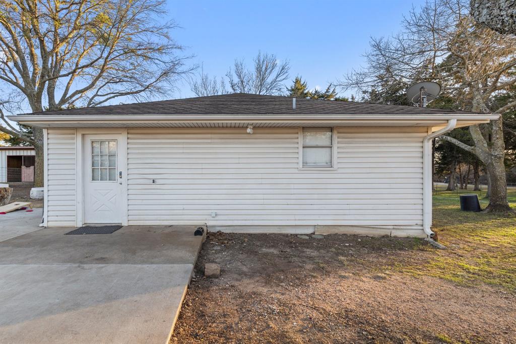 1715 South Joe Wilson Road Ovilla, TX 75104 - Photo 9 of 40 a view of a house with a garage