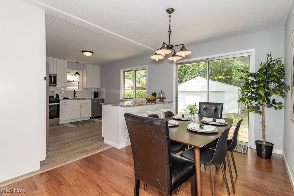 32609 Knobel Road Willowick, OH 44095 - Photo 5 of 29 Dining room with hardwood floors and new fixtures
