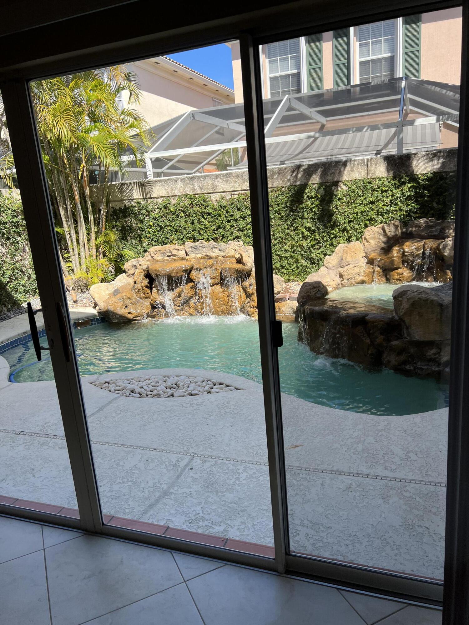 17 Oakleaf Court Tequesta, FL 33469 - Photo 18 of 81 INTERIOR POOL VIEW