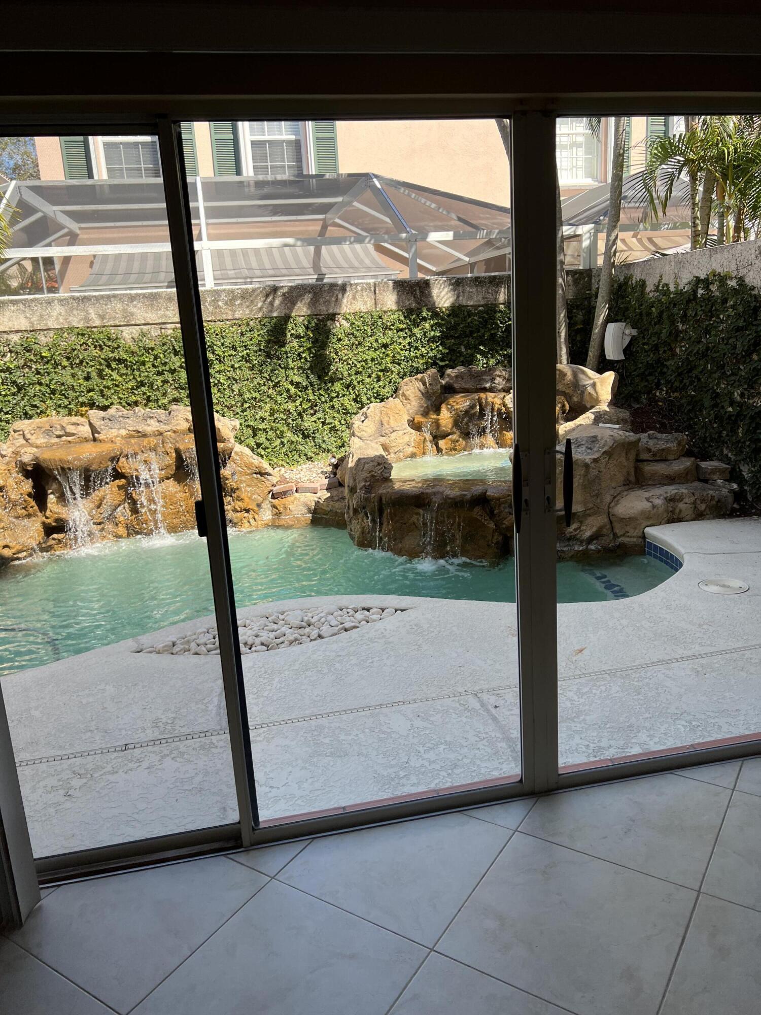 17 Oakleaf Court Tequesta, FL 33469 - Photo 19 of 81 INTERIOR POOL VIEW