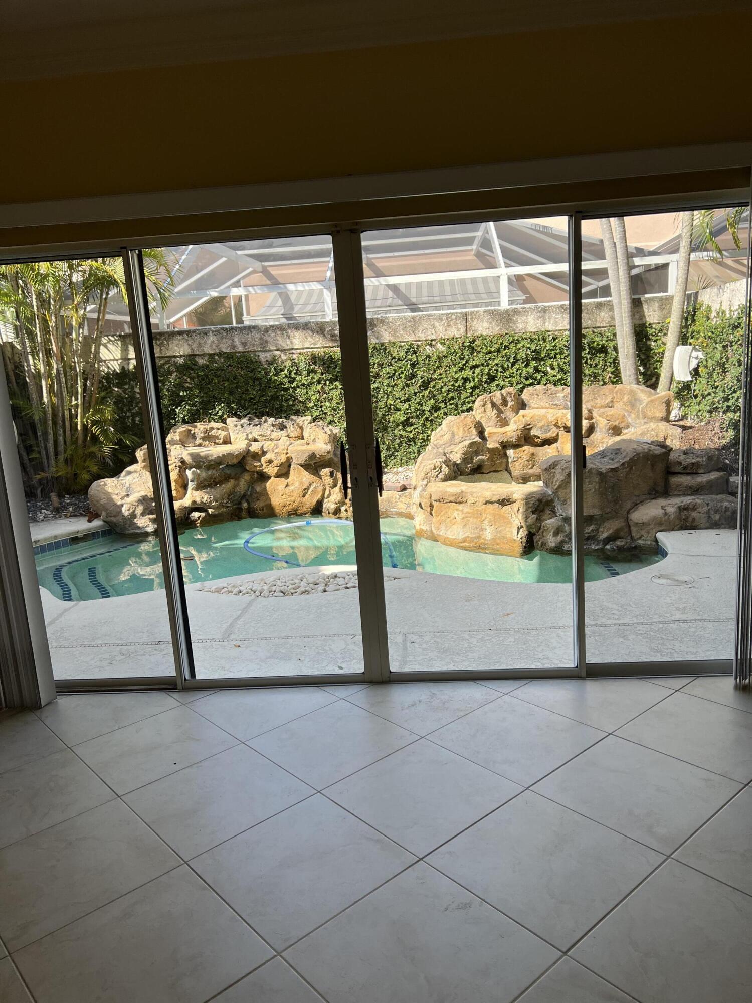 17 Oakleaf Court Tequesta, FL 33469 - Photo 20 of 81 INTERIOR POOL VIEW