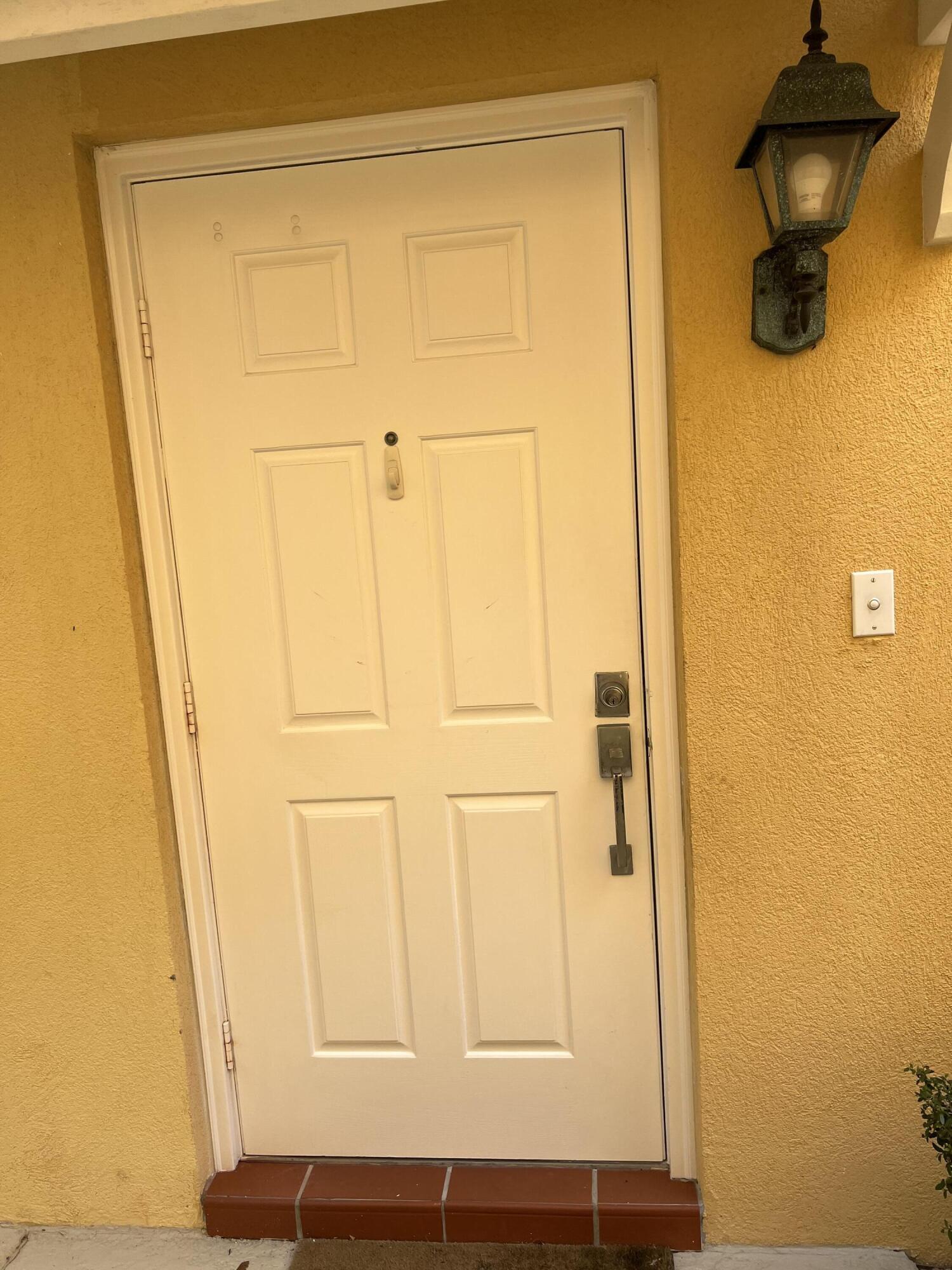 17 Oakleaf Court Tequesta, FL 33469 - Photo 27 of 81 HOME SIDE ENTRANCE