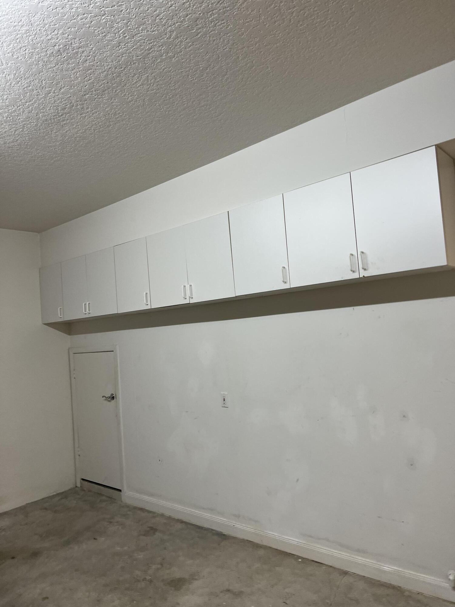 17 Oakleaf Court Tequesta, FL 33469 - Photo 48 of 81 GARAGE CABINETS