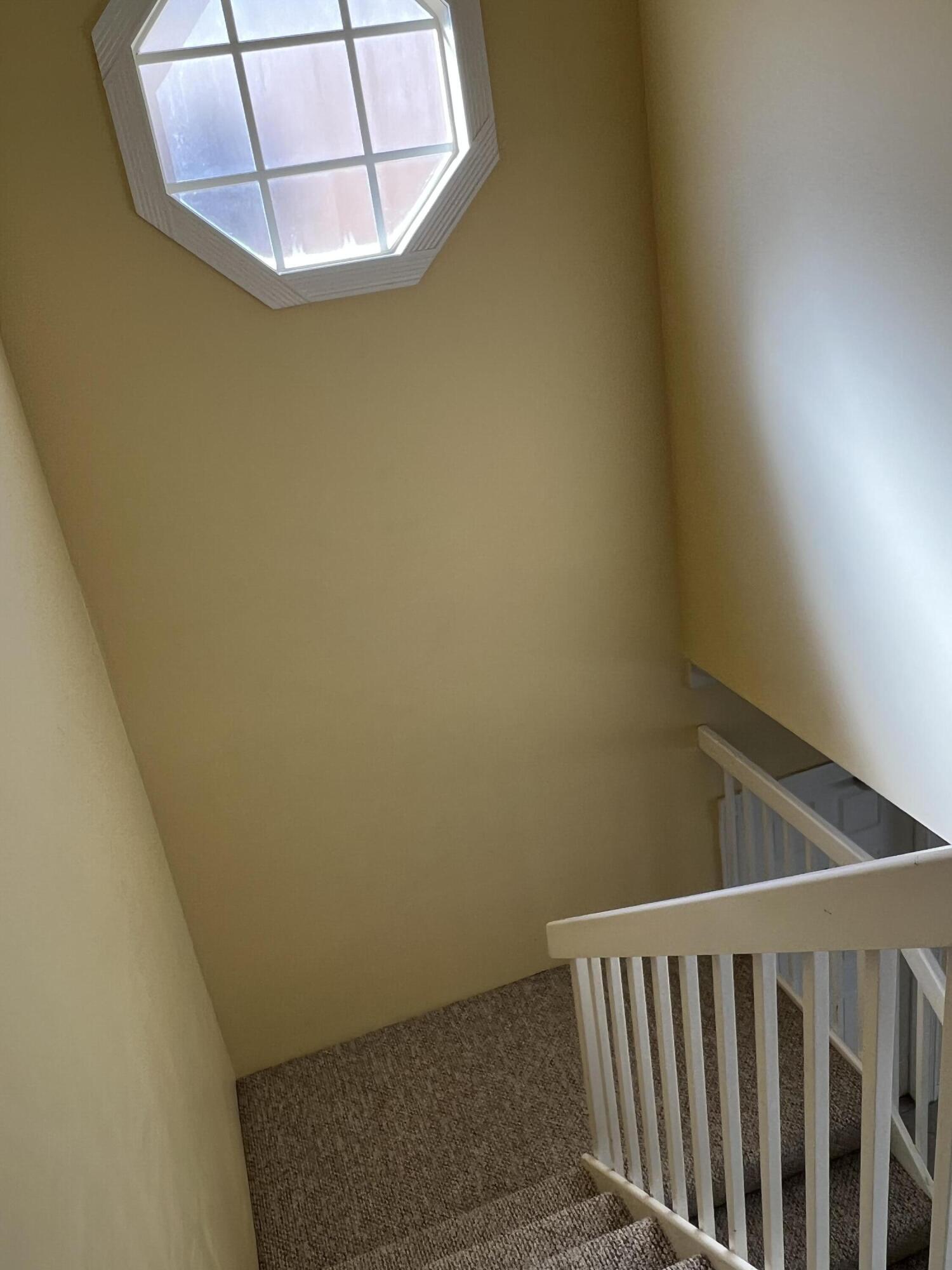 17 Oakleaf Court Tequesta, FL 33469 - Photo 55 of 81 STAIRCASE TO SECOND LEVEL