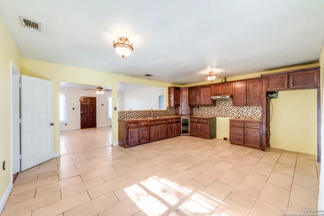 a large kitchen with a cabinets and counter space