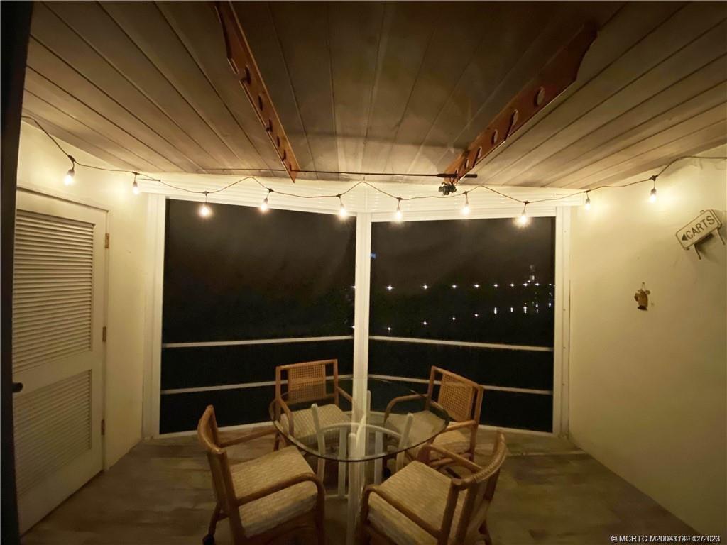 3901 Southeast St Lucie Boulevard, Unit D29 Stuart, FL 34997 - Photo 17 of 26 a view of chair in the room