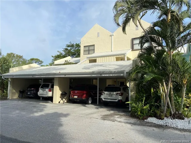 a view of car parked in front of house