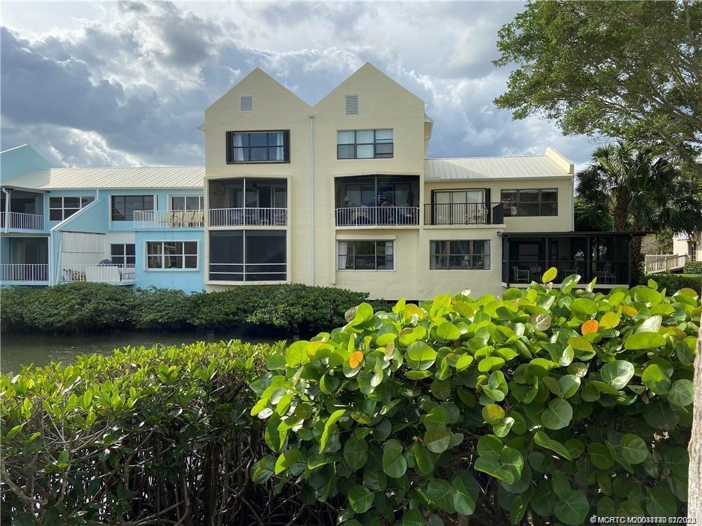 3901 Southeast St Lucie Boulevard, Unit D29 Stuart, FL 34997 - Photo 3 of 26 a view of a house with garden and plants
