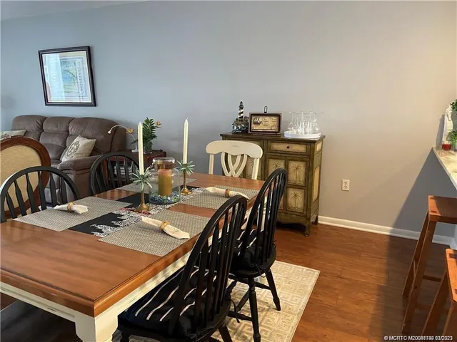 a view of a dining room with furniture