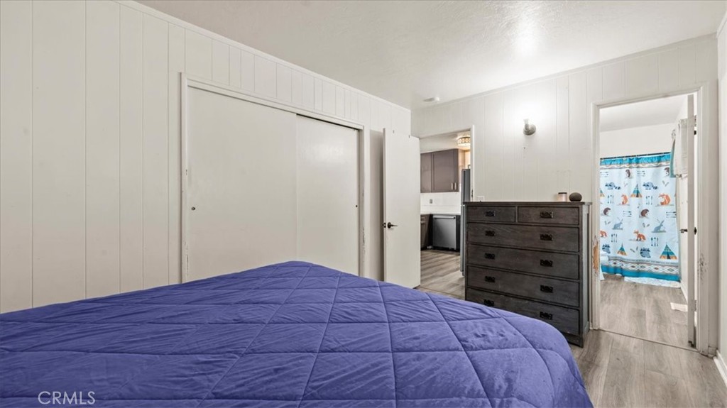 31347 Circle View Drive Running Springs, CA 92382 - Photo 17 of 48 a bedroom with a bed and a dresser