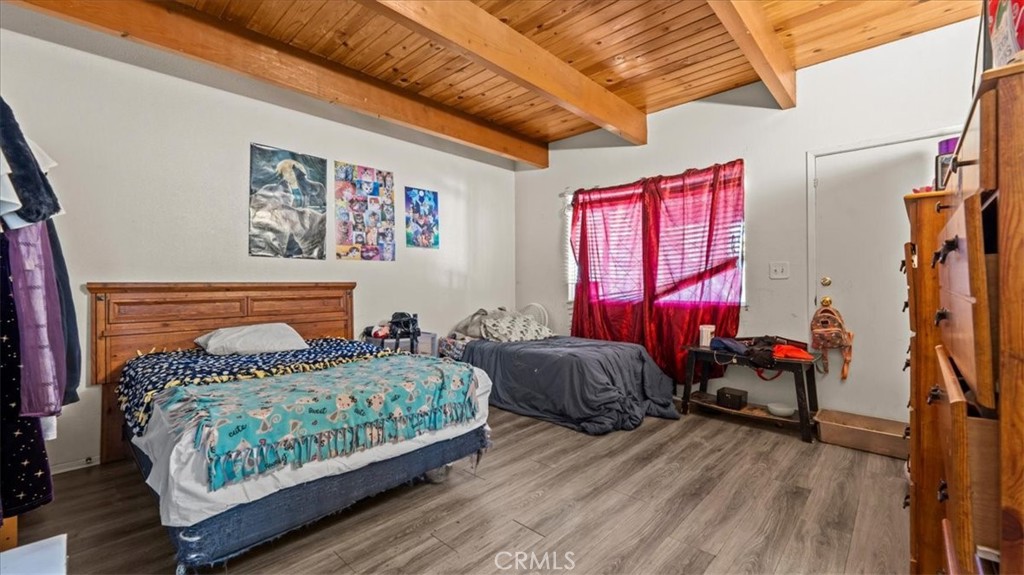 31347 Circle View Drive Running Springs, CA 92382 - Photo 19 of 48 a bedroom with two beds and a window