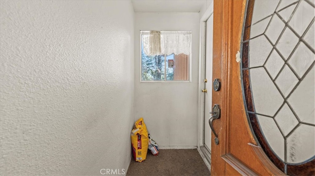 31347 Circle View Drive Running Springs, CA 92382 - Photo 2 of 48 a view of utility room