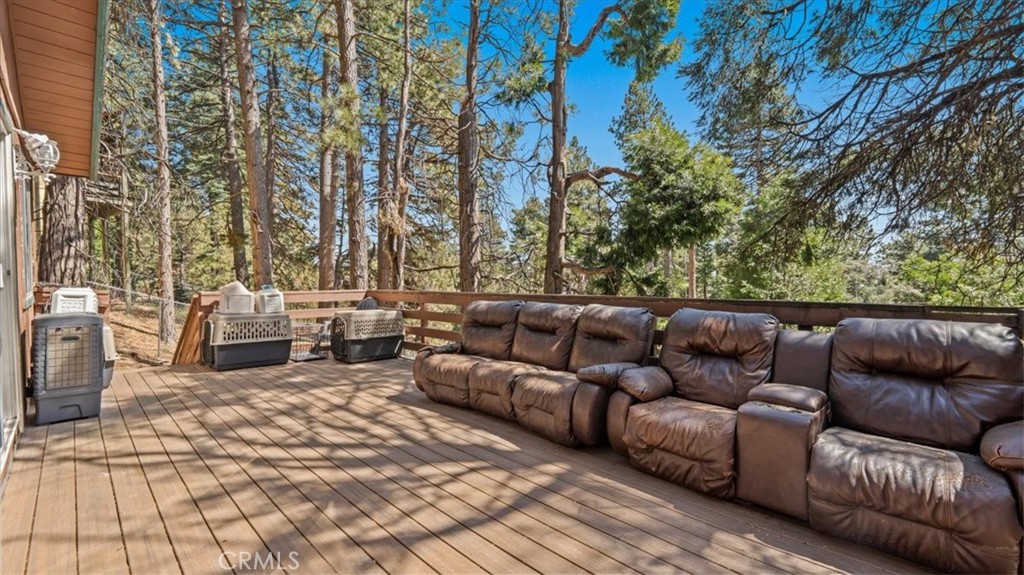 31347 Circle View Drive Running Springs, CA 92382 - Photo 29 of 48 a roof deck with couches and potted plants