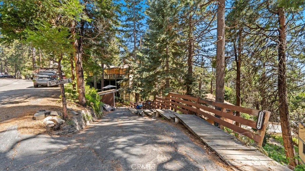 31347 Circle View Drive Running Springs, CA 92382 - Photo 32 of 48 a view of outdoor space with deck and tree