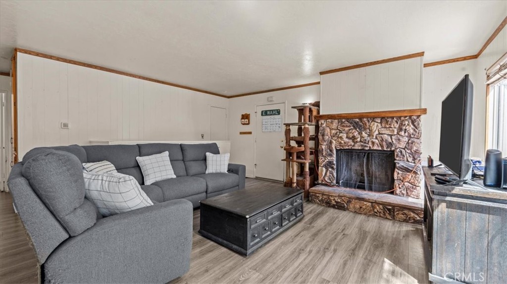 31347 Circle View Drive Running Springs, CA 92382 - Photo 6 of 48 a living room with furniture and a fireplace