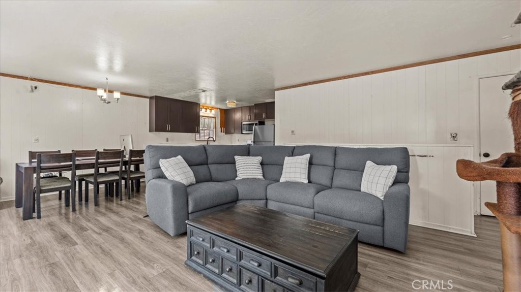31347 Circle View Drive Running Springs, CA 92382 - Photo 7 of 48 a living room with furniture a wooden floor and a sink