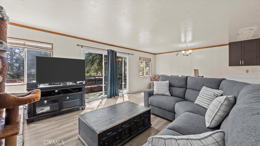 31347 Circle View Drive Running Springs, CA 92382 - Photo 9 of 48 a living room with furniture and a flat screen tv