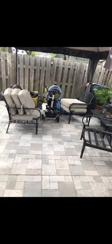 a view of outdoor space with lounge chair