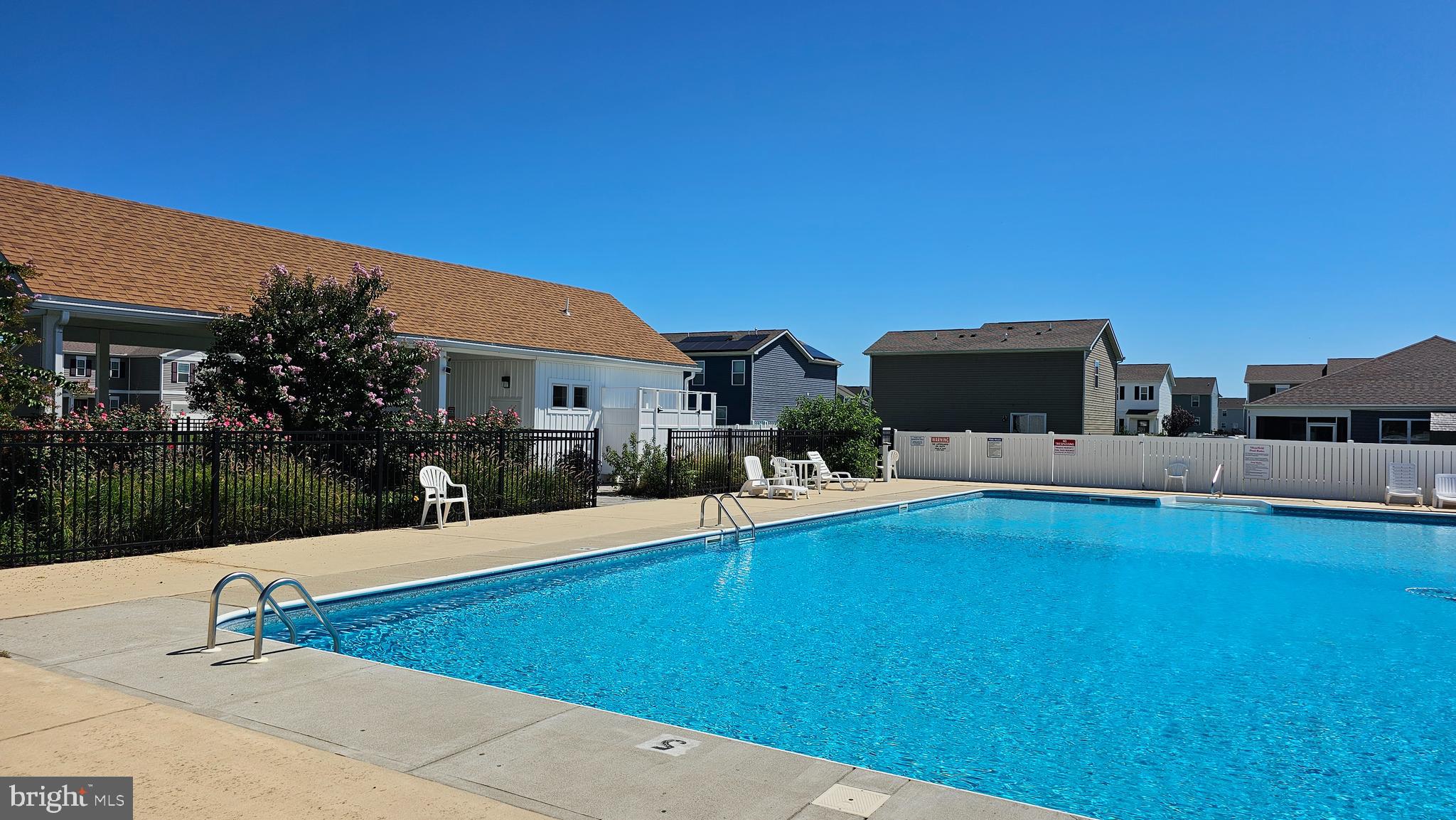 11 Orchard Road Seaford, DE 19973 - Photo 12 of 76 a view of a house with swimming pool and a yard