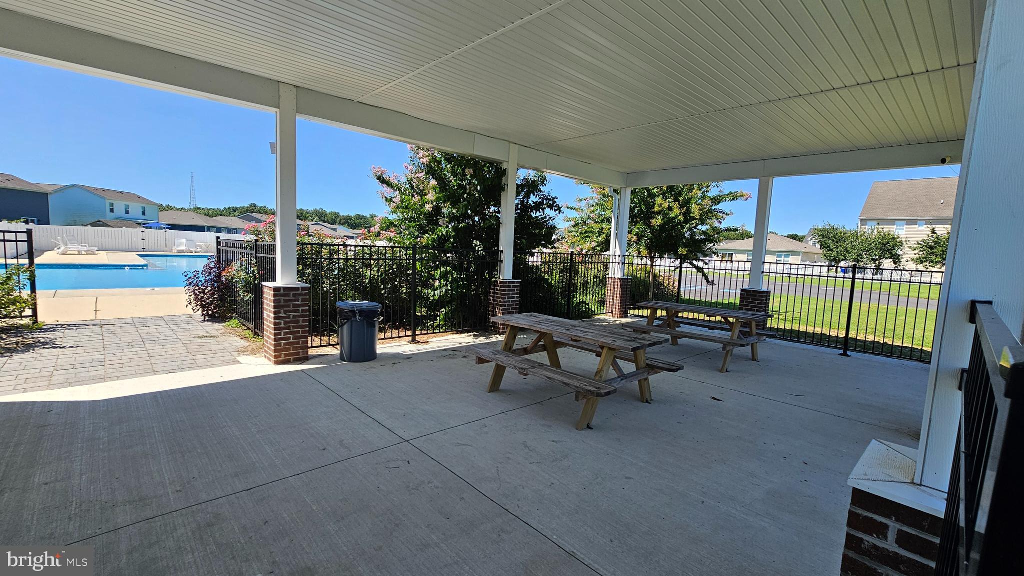 11 Orchard Road Seaford, DE 19973 - Photo 16 of 76 a living room with patio furniture and a garden