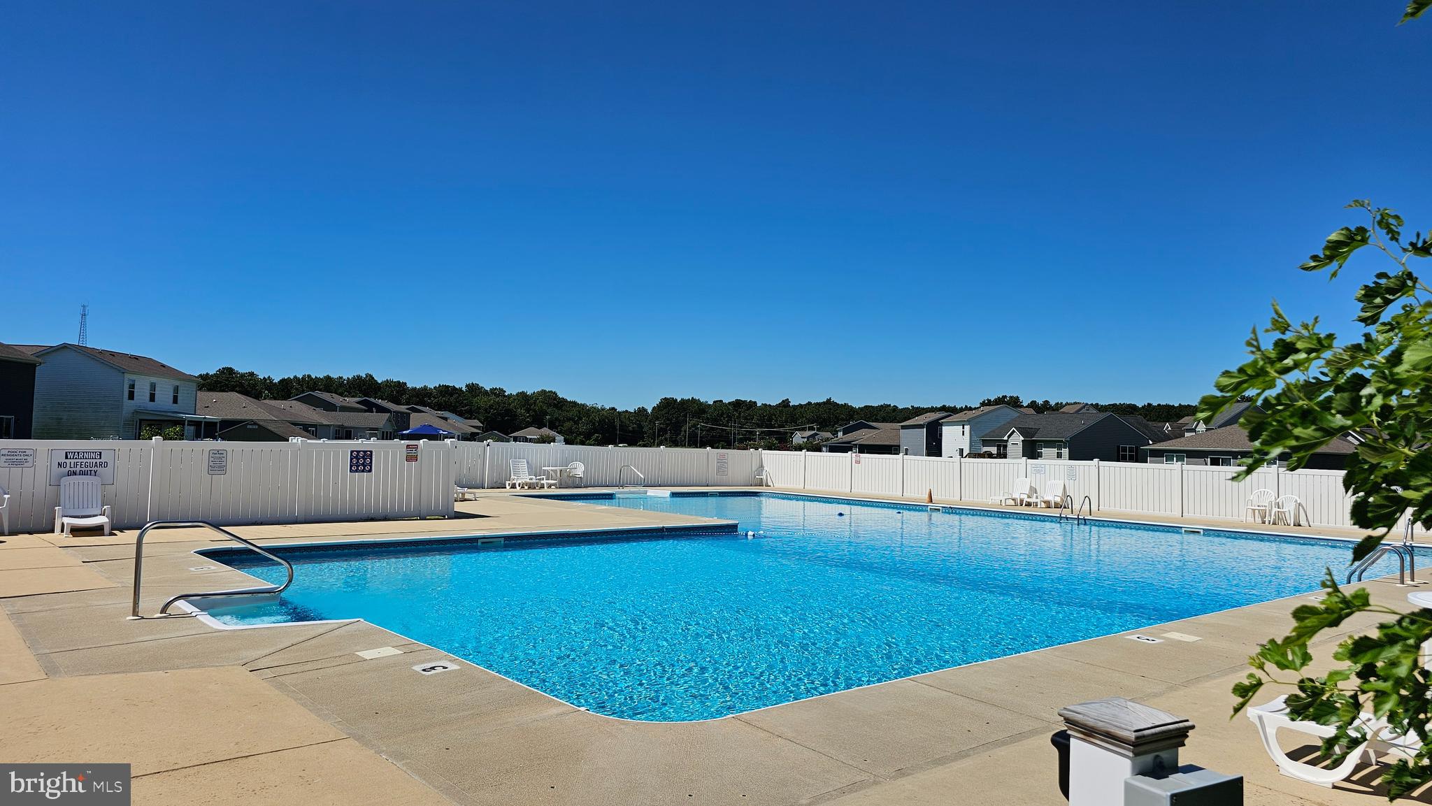 11 Orchard Road Seaford, DE 19973 - Photo 17 of 76 a view of a swimming pool and lounge chair