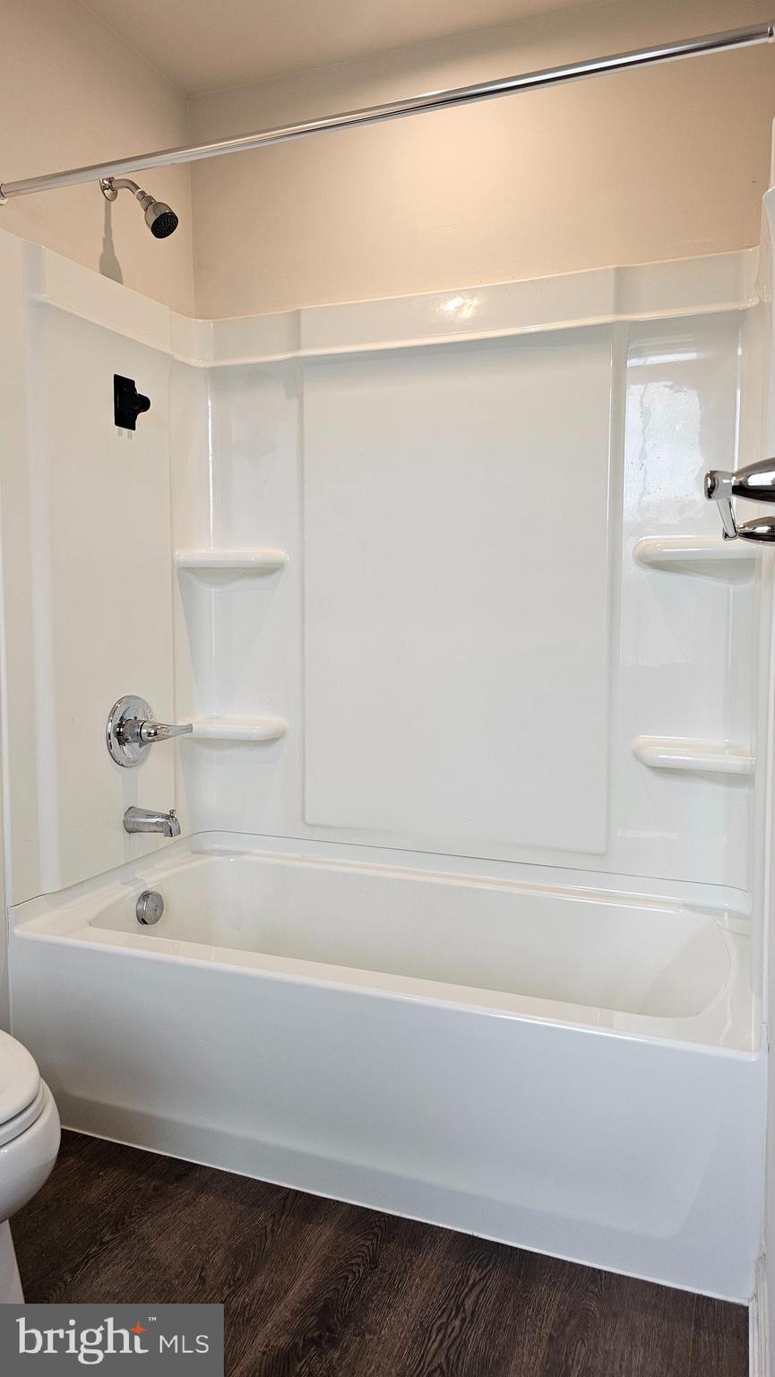 11 Orchard Road Seaford, DE 19973 - Photo 41 of 76 a bathroom with a bathtub and a shower