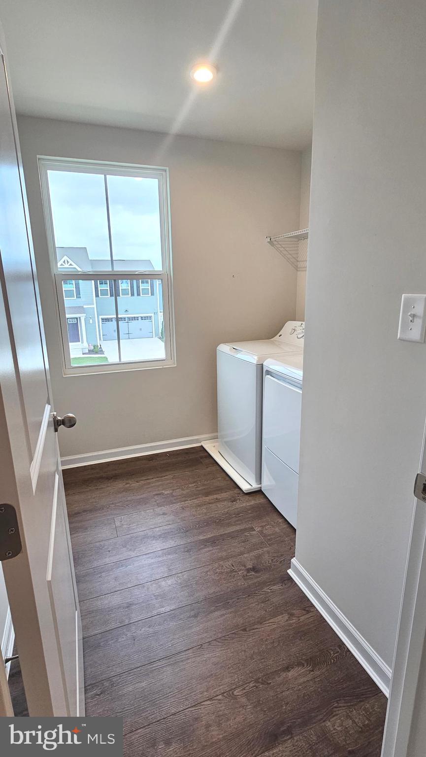11 Orchard Road Seaford, DE 19973 - Photo 48 of 76 an empty room with wooden floor and windows