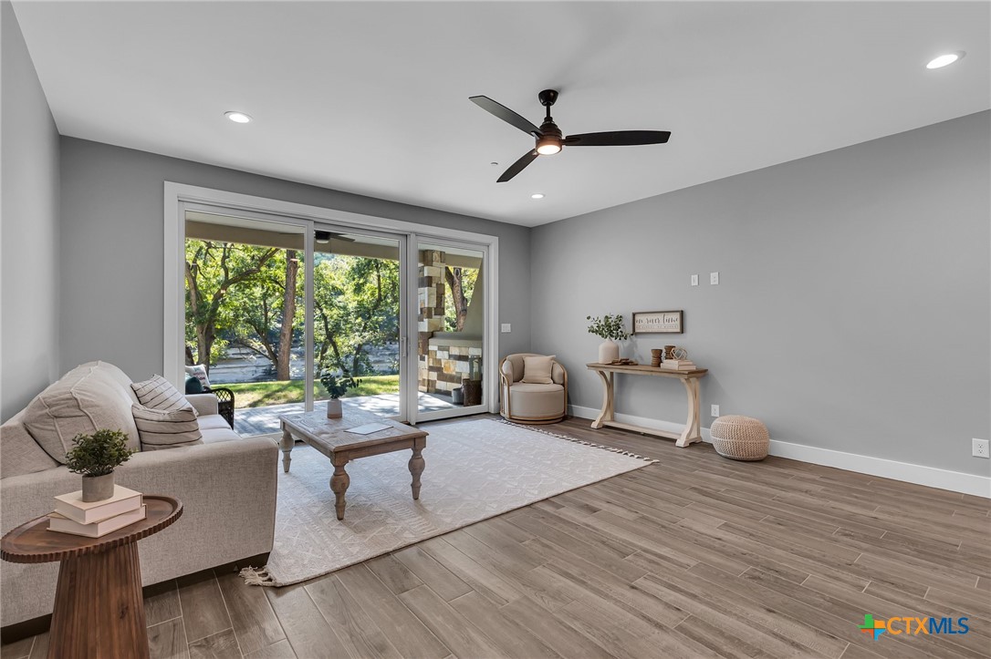 540 River Run, Unit 314 New Braunfels, TX 78132 - Photo 2 of 15 a living room with furniture and a window