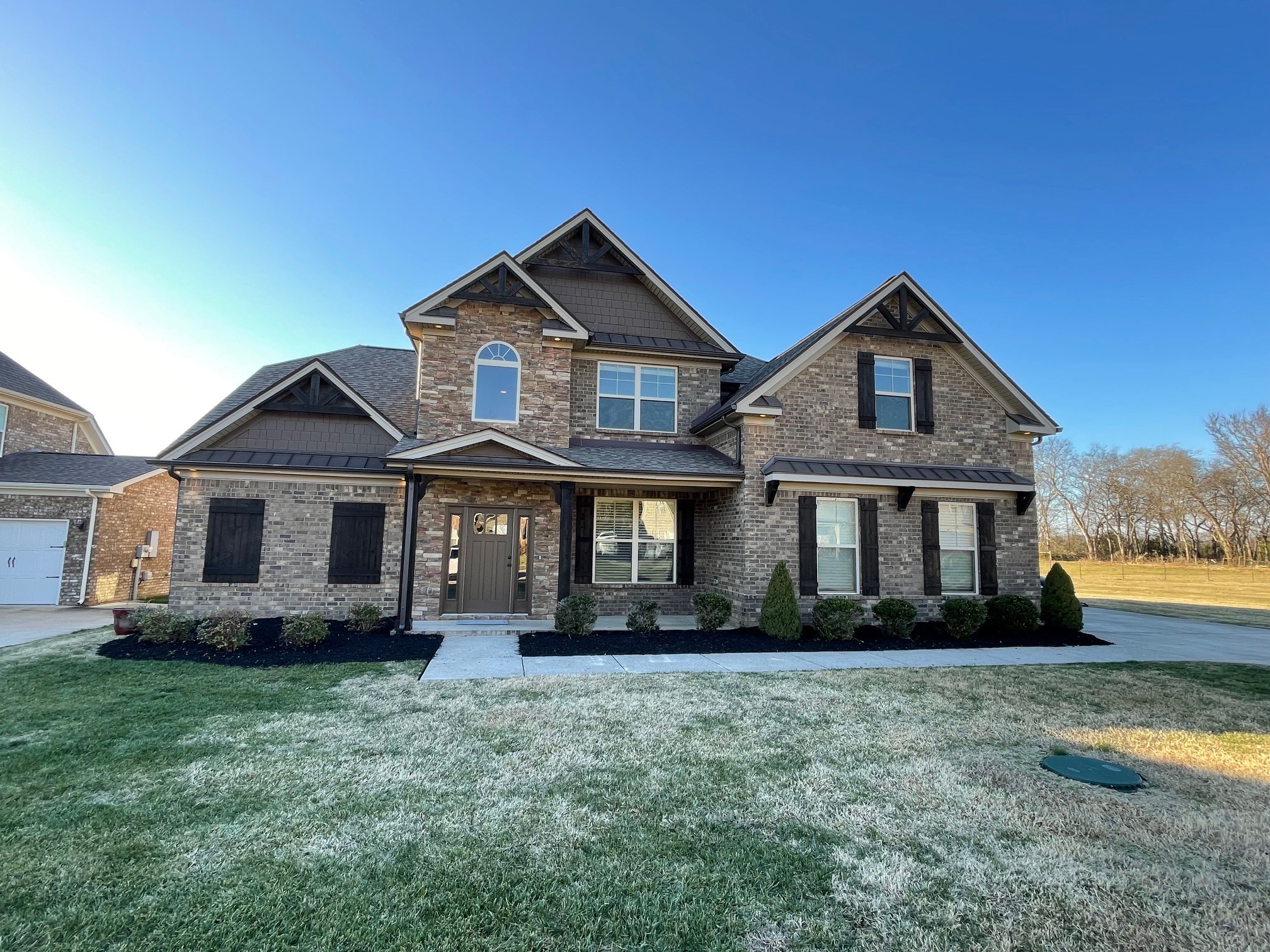 236 McClaran Place Murfreesboro, TN 37129 - Photo 1 of 48 a front view of a house with garden
