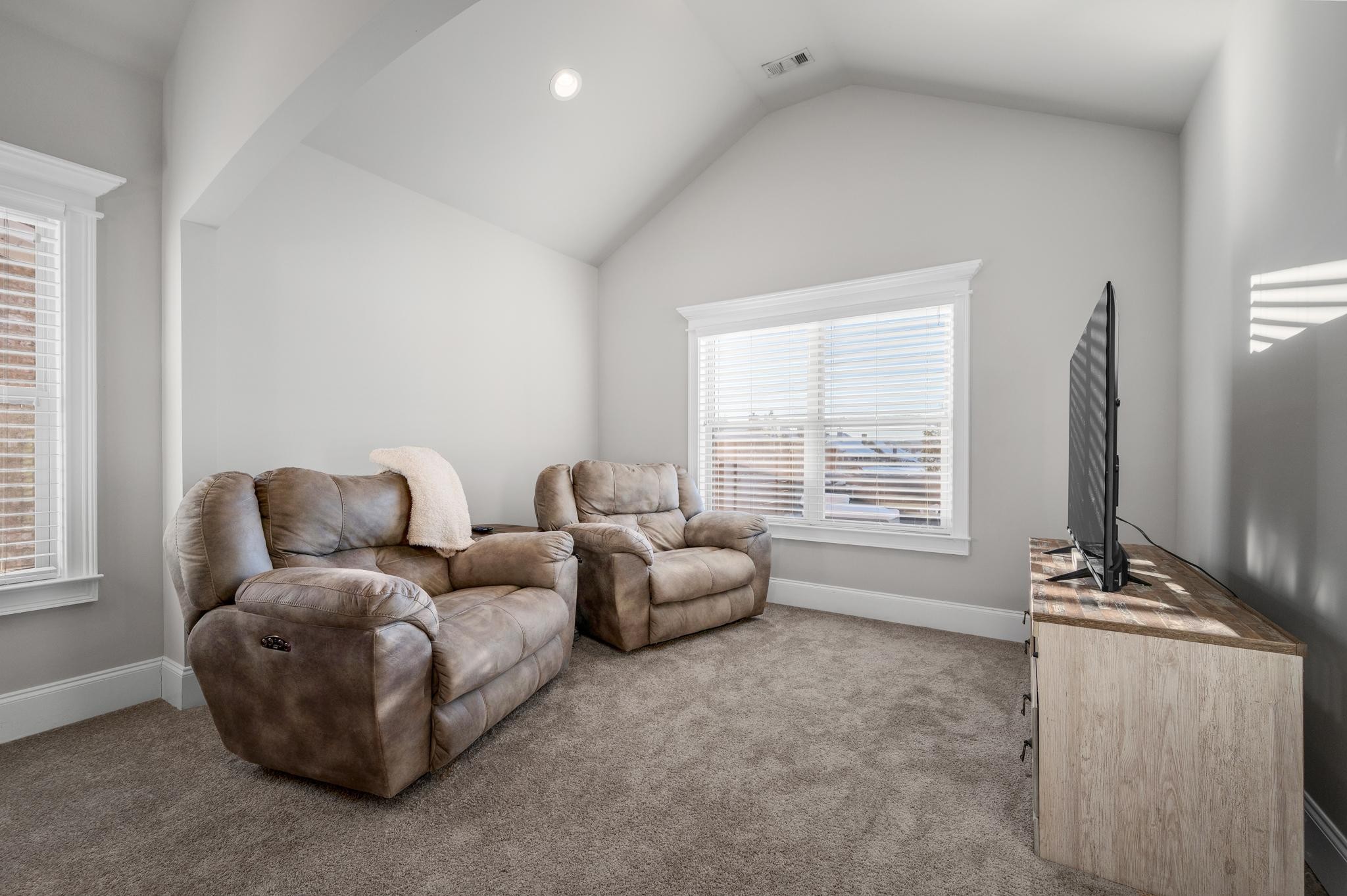 236 McClaran Place Murfreesboro, TN 37129 - Photo 23 of 48 a living room with furniture a flat screen tv and a large window