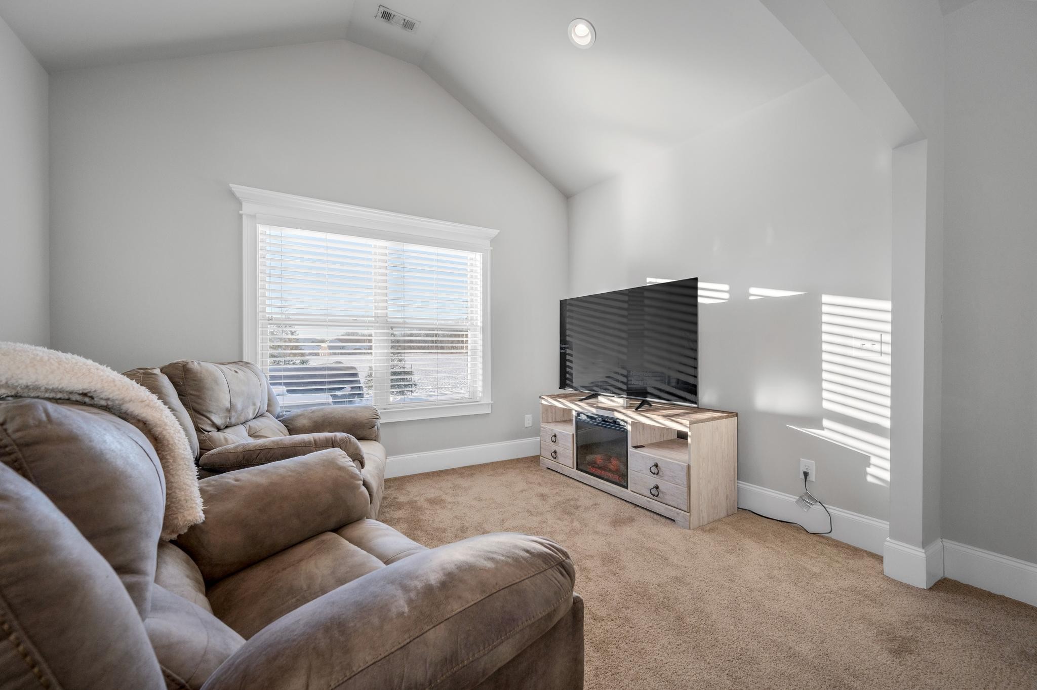 236 McClaran Place Murfreesboro, TN 37129 - Photo 24 of 48 a living room with furniture and a flat screen tv
