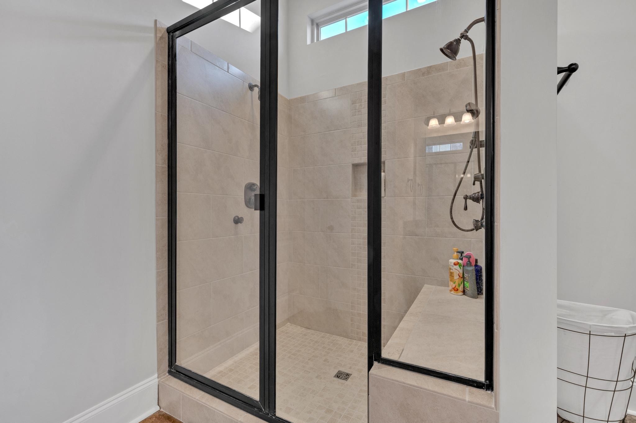 236 McClaran Place Murfreesboro, TN 37129 - Photo 27 of 48 a bathroom with a shower and mirror