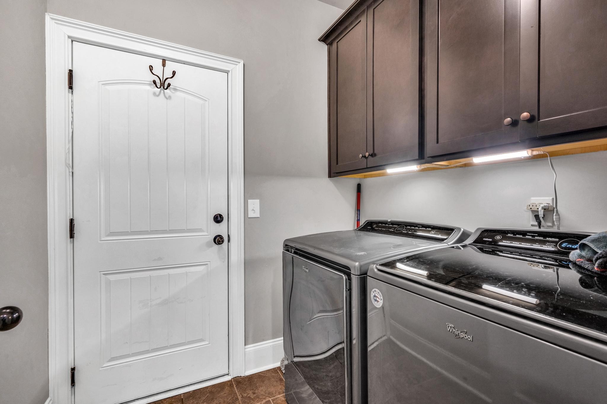 236 McClaran Place Murfreesboro, TN 37129 - Photo 29 of 48 a kitchen with a stove and a cabinet