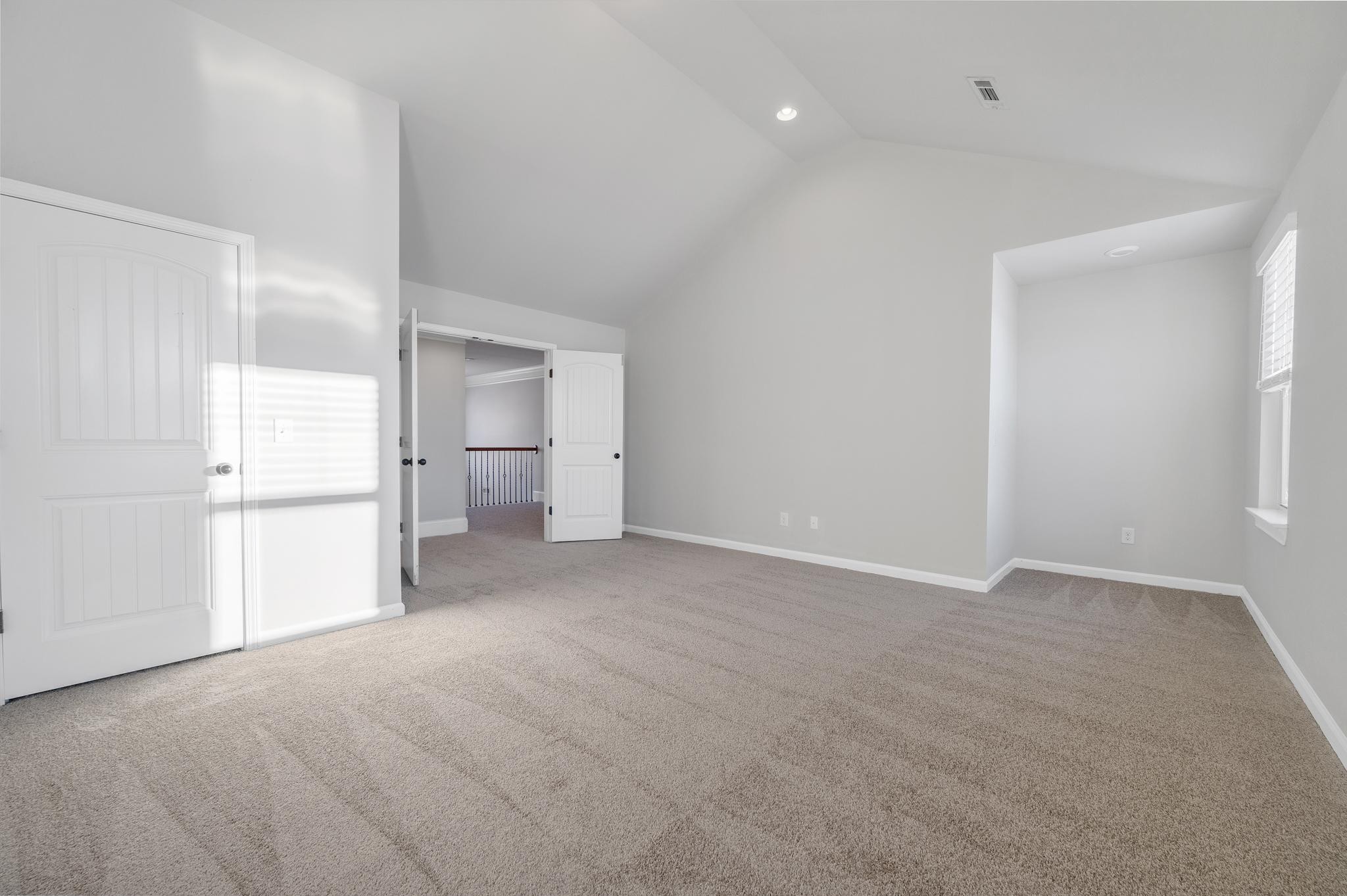236 McClaran Place Murfreesboro, TN 37129 - Photo 34 of 48 a view of an empty room with a kitchen