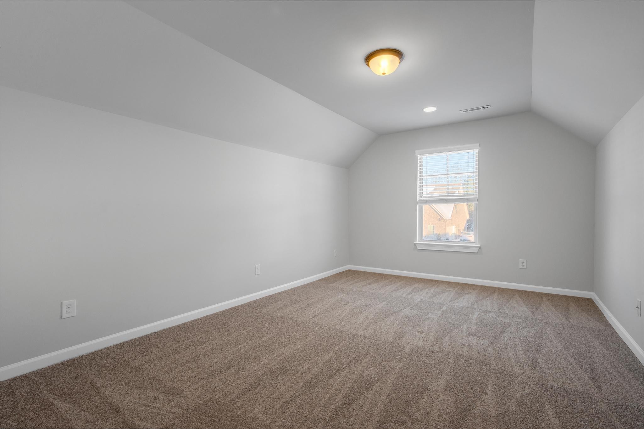 236 McClaran Place Murfreesboro, TN 37129 - Photo 37 of 48 an empty room with a window and wooden floor