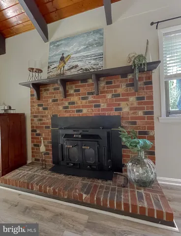 a kitchen with sink cabinets and refrigerator