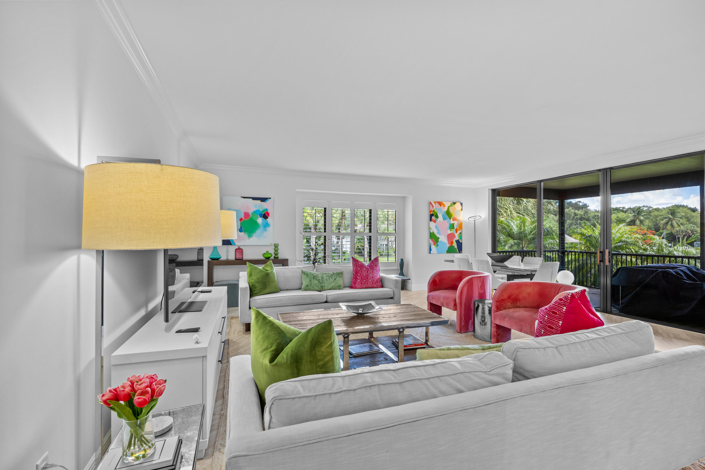 13254 Polo Club Road, Unit C204 Wellington, FL 33414 - Photo 11 of 29 a living room with furniture and a floor to ceiling window
