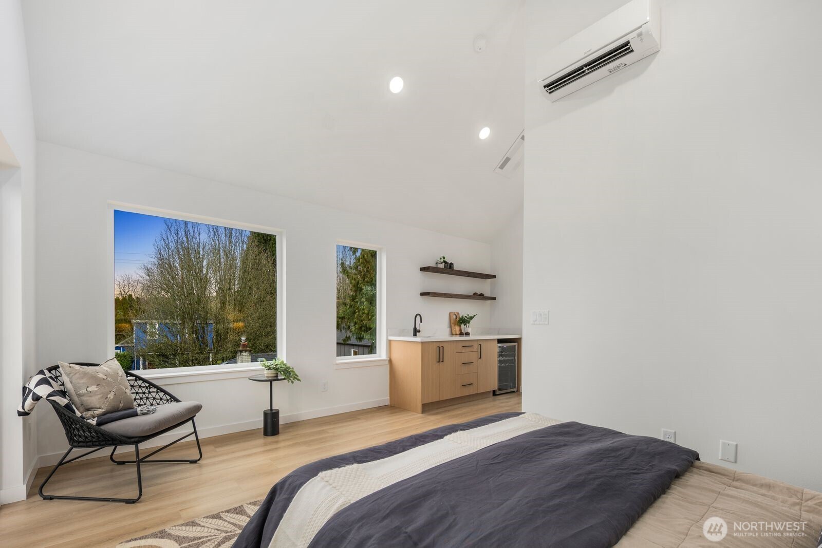 806 South Rose Street Seattle, WA 98108 - Photo 15 of 20 a bedroom with a bed and wooden floor