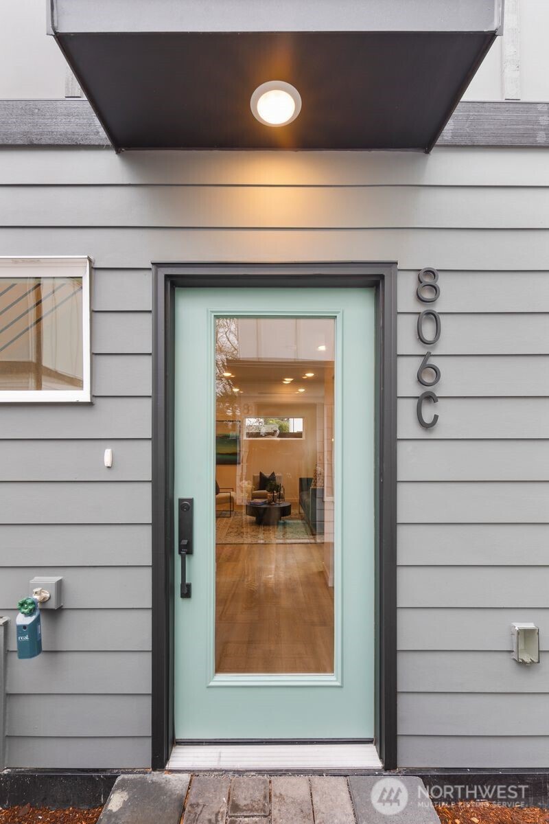 806 South Rose Street Seattle, WA 98108 - Photo 4 of 20 a view of a door and a window