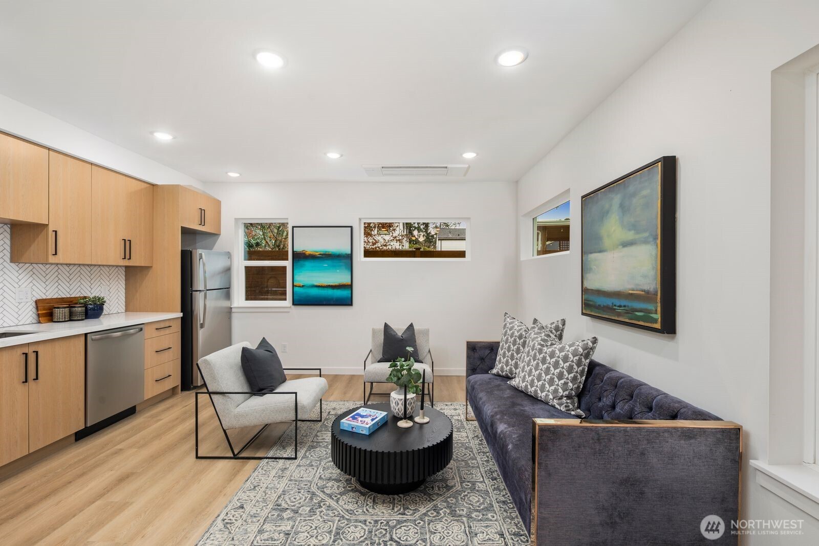 806 South Rose Street Seattle, WA 98108 - Photo 5 of 20 a living room with furniture and a potted plant