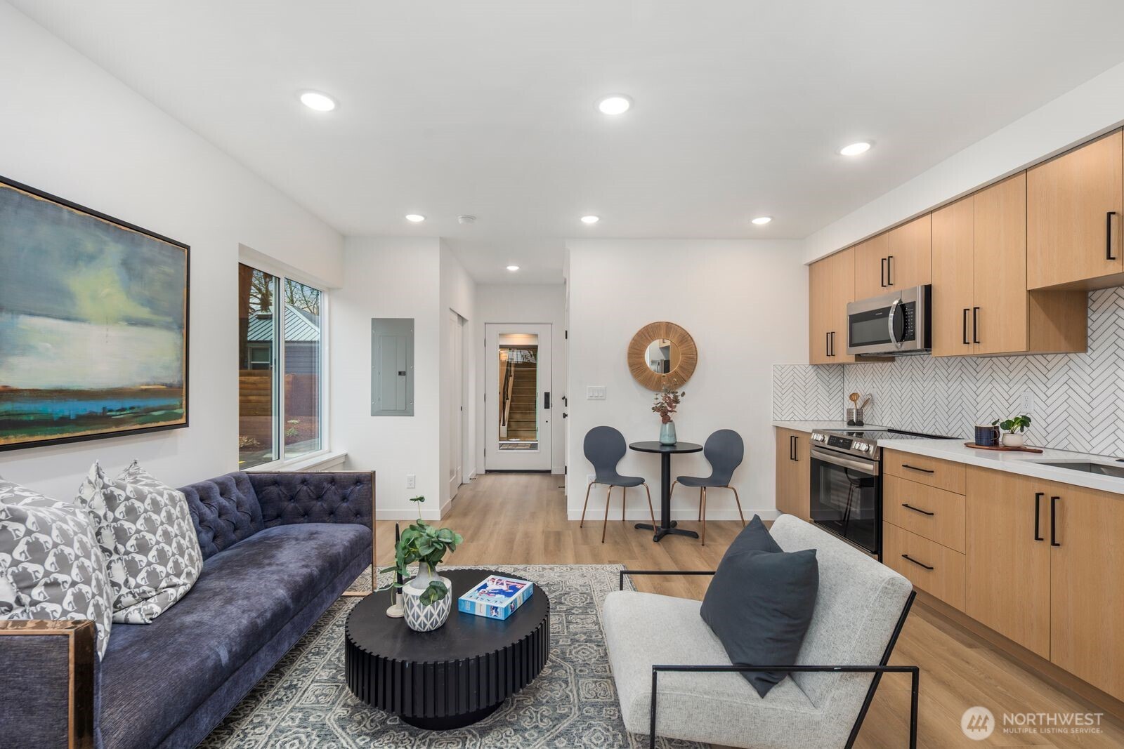 806 South Rose Street Seattle, WA 98108 - Photo 8 of 20 a living room with furniture and a flat screen tv